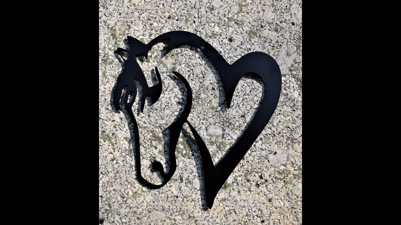 Black custom metal horse head with a heart for the shoulders. 8 inches by 8 inches priced at 10 dollars.