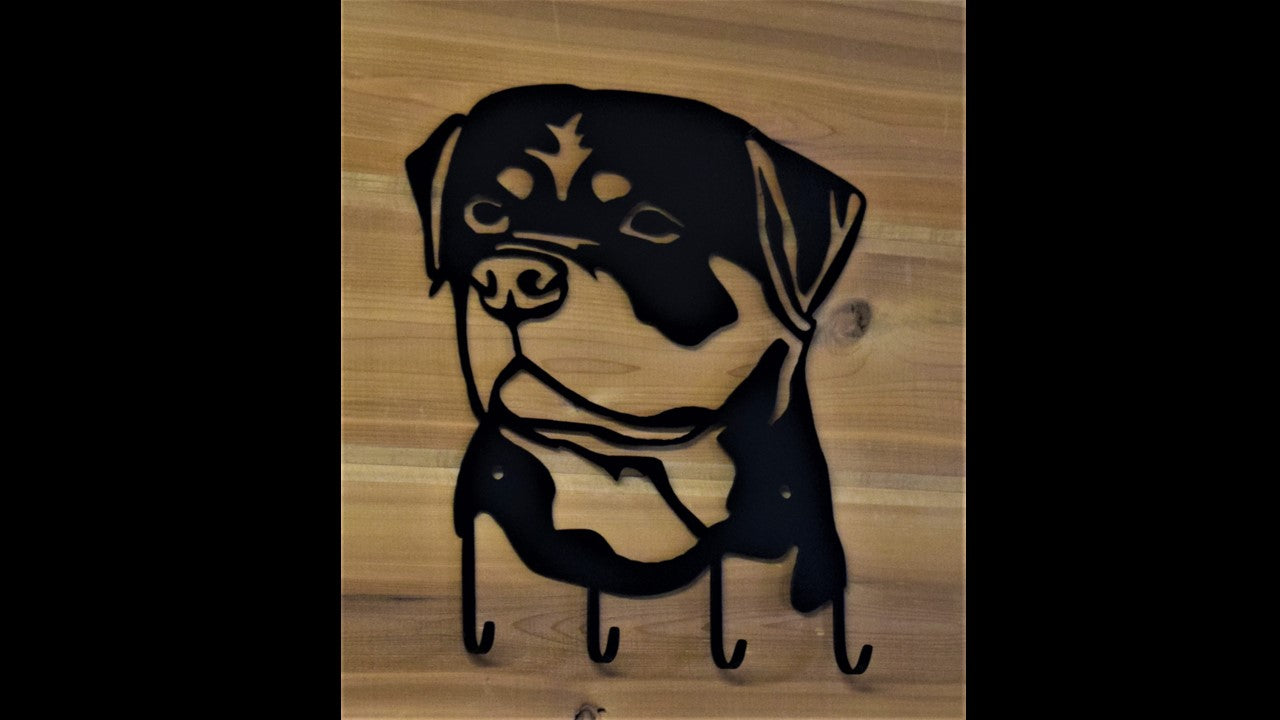 Black custom metal Rottweiler with 4 metal hooks. 11.5 inches tall by 10 inches long. Priced at 20 dollars SKU number RWKH