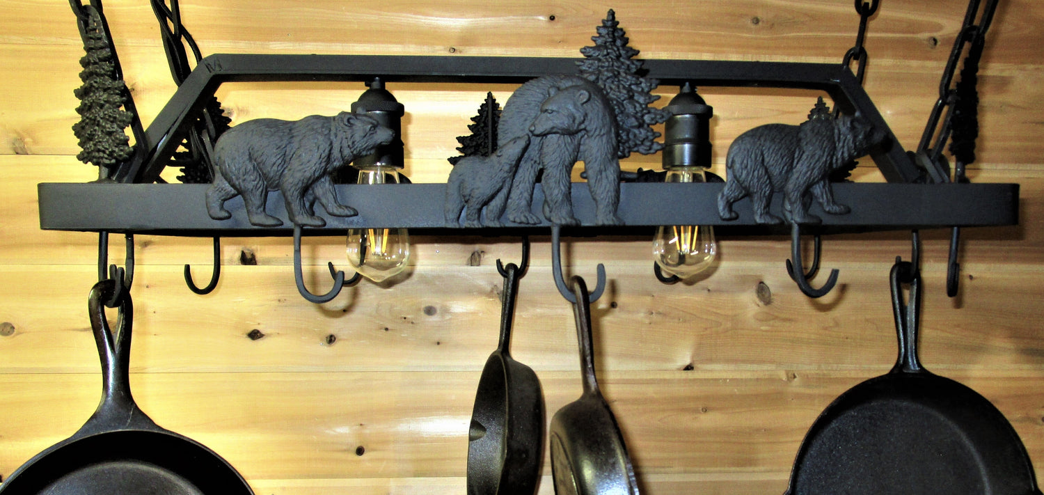 Custom metal Bear themed pot rack with lighting in the center. Featuring bears, and trees. 28 by 14 by 9 priced at $895.00