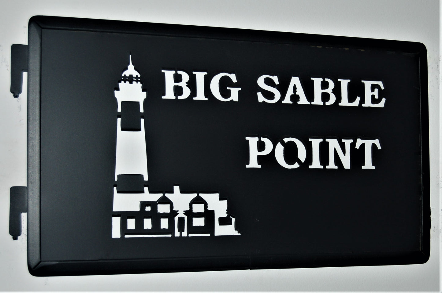 black metal big sable point inspiring panel featuring the lighthouse  