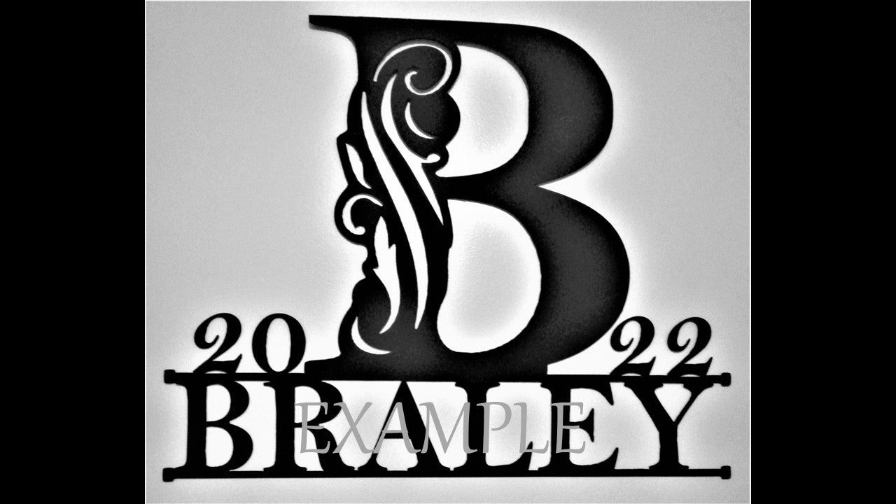 black metal custom silhouette customizable featuring Braley with upper case B centered and the year above the name. 24 inches by 24 inches Priced at 120 dollars. Customizable Monogram contact us for pricing at 231-299-7610