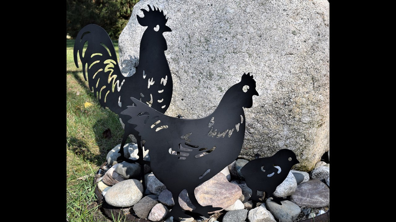 Custom black metal chicken featuring a rooster hen and chick including yard stakes. Priced at 90 dollars for all 3. 