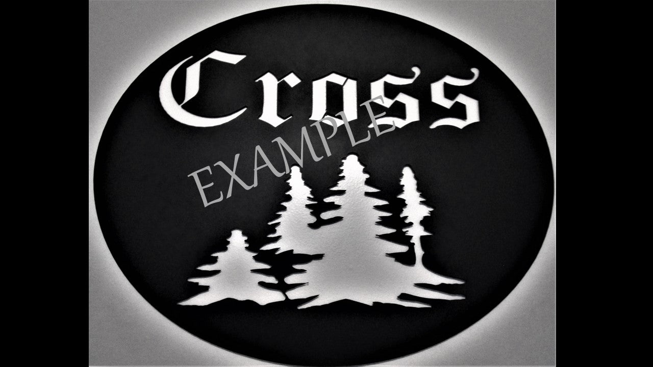 Black metal custom silhouette featuring pine tree's and the last name Cross. 16 inches by 14 inches priced at 60 dollars. Customizable contact us for pricing at 231-299-7610