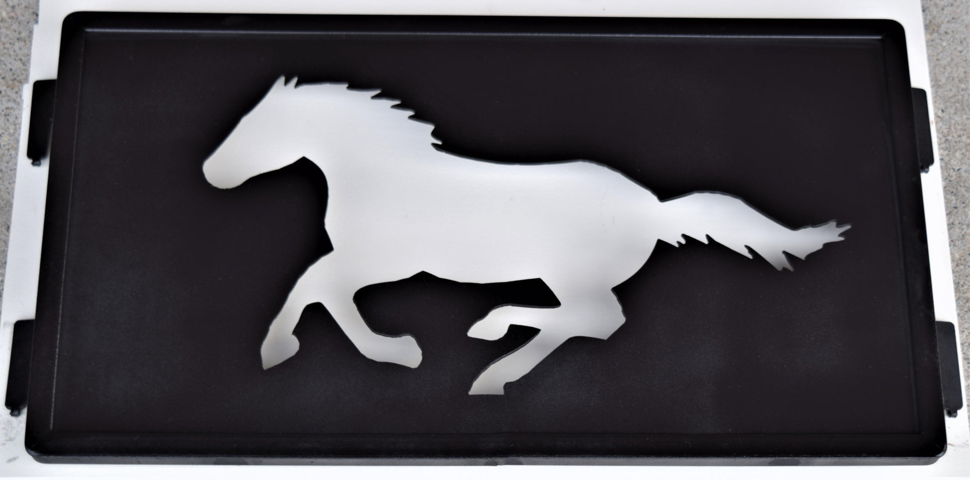 black metal inspiring panel featuring a galloping horse