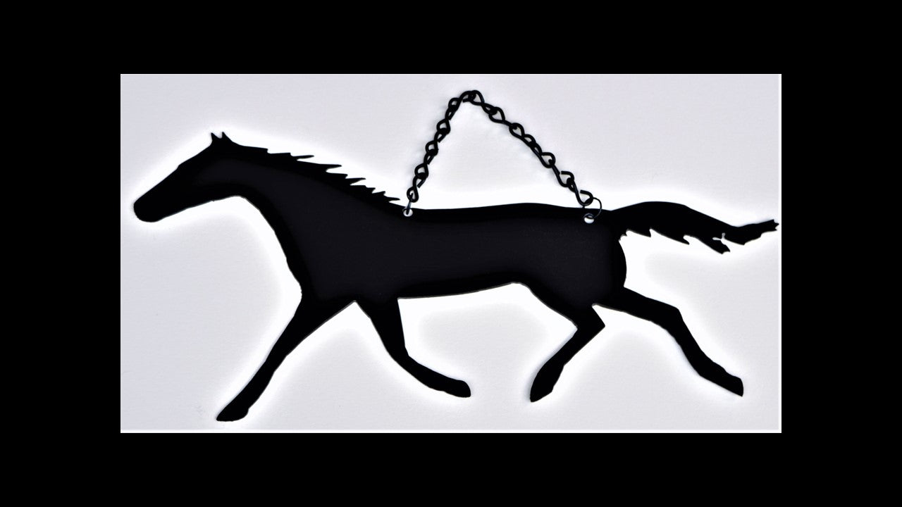 black metal custom trotting horse with black chain for hanging 14 inches by 7 inches. Priced at 20 dollars. SKU number SCH1