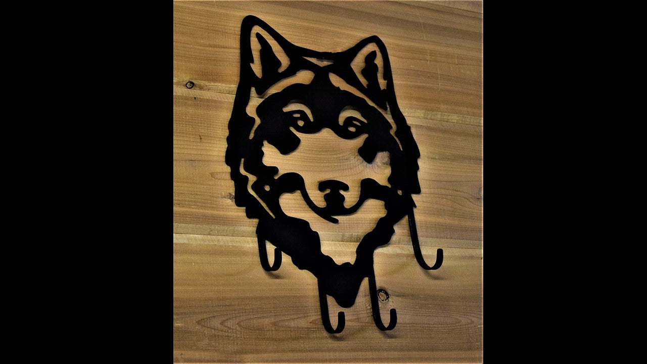 Black metal custom Husky with 4 metal key hooks. 12 inches by 7.5 inches long. Priced at 20 dollars SKU number HKKH