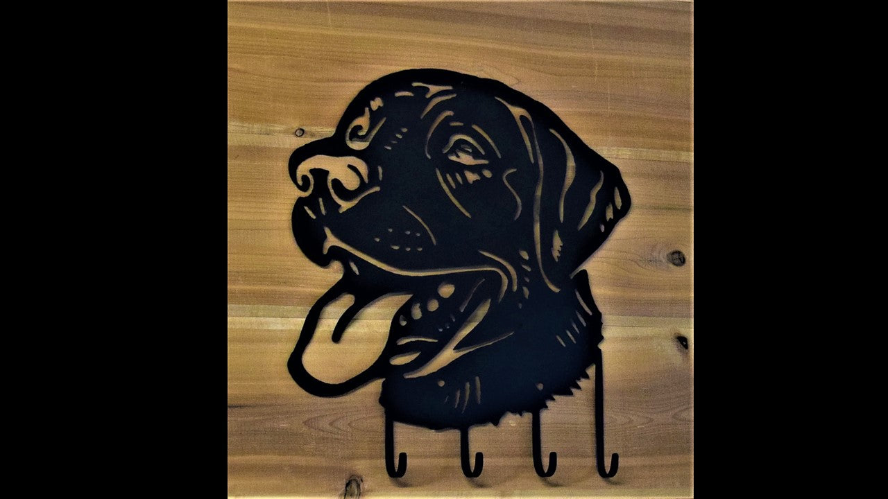 Black metal custom Labrador Retriever with 4 metal hooks. 12 inches tall by 11 inches long. Priced at 20 dollars SKU number LRKH