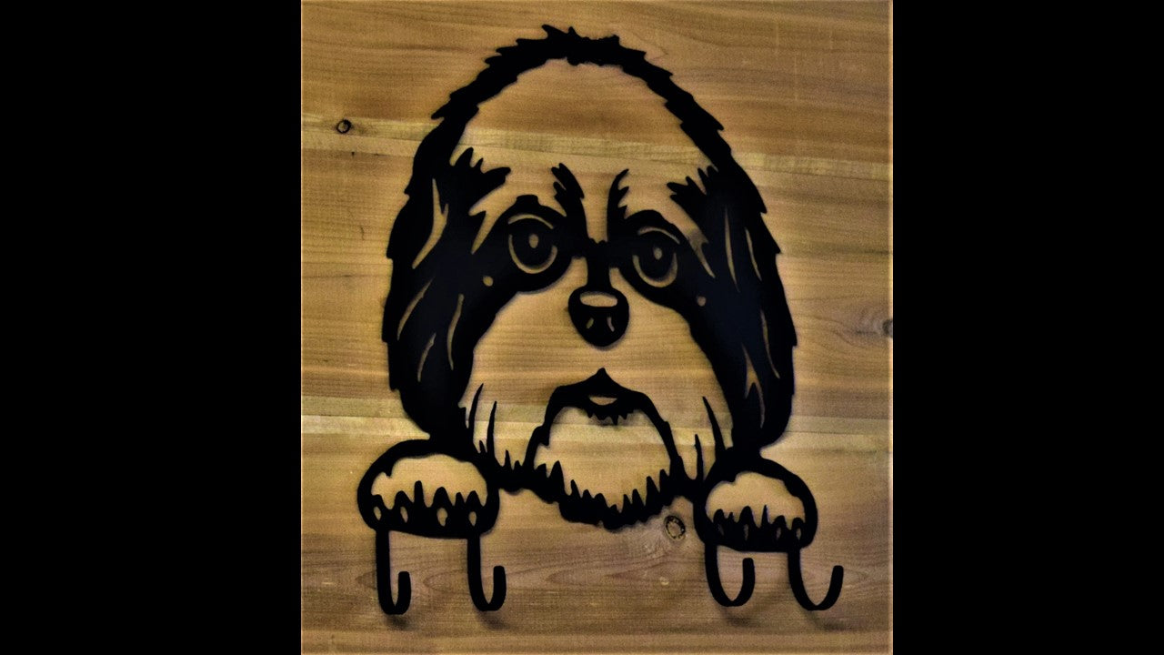 Black metal custom Shih Tzu key hook with 4 metal key hooks. 11.5 inches tall by 10 inches long. Priced at 20 dollars SKU number STKH 