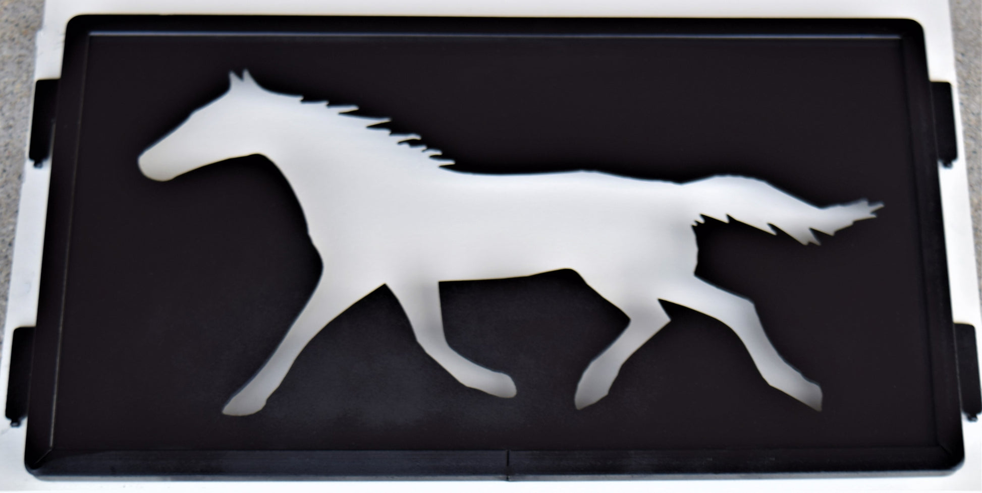black metal inspiring panel featuring a trotting horse